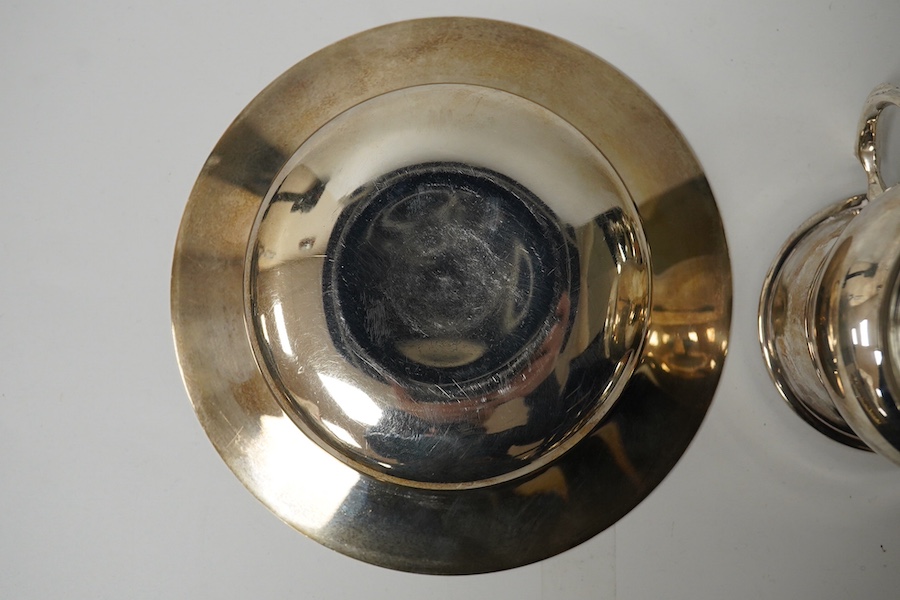 A modern silver Armada dish, London, 1990, 14.7cm and a modern silver baluster christening mug, 9.3oz. Condition - fair to good